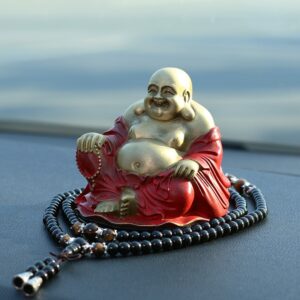 Tượng Di Lặc bằng đồng để oto